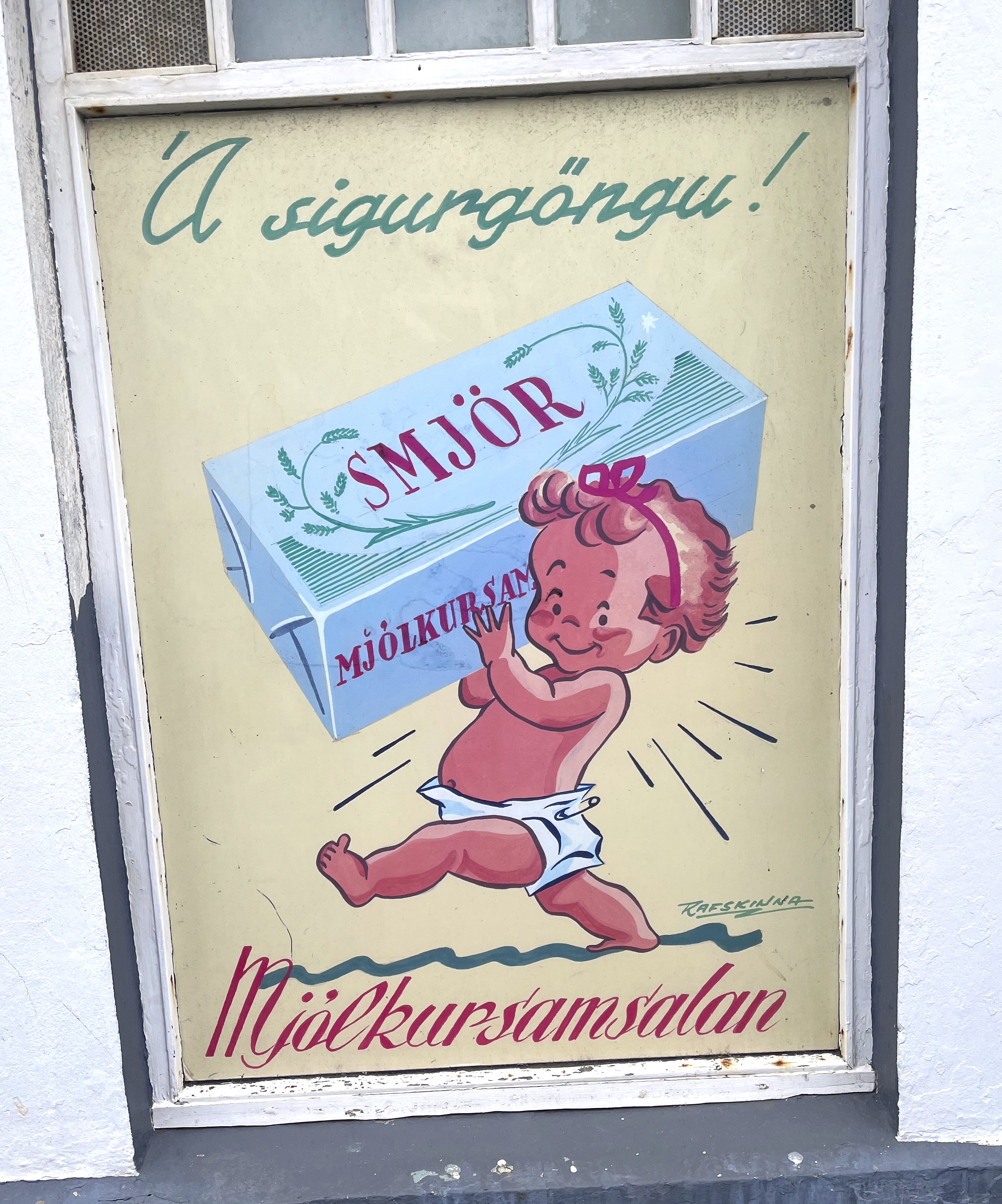 På bilden ser vi en gammal reklambild för smör på Island 